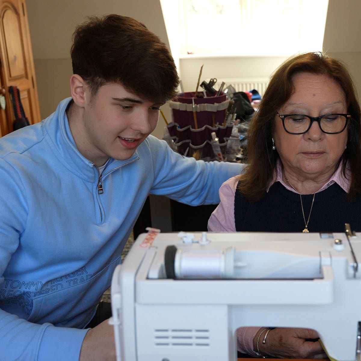 Harrison and his nan at her sewing machine, making the first CoolTowel